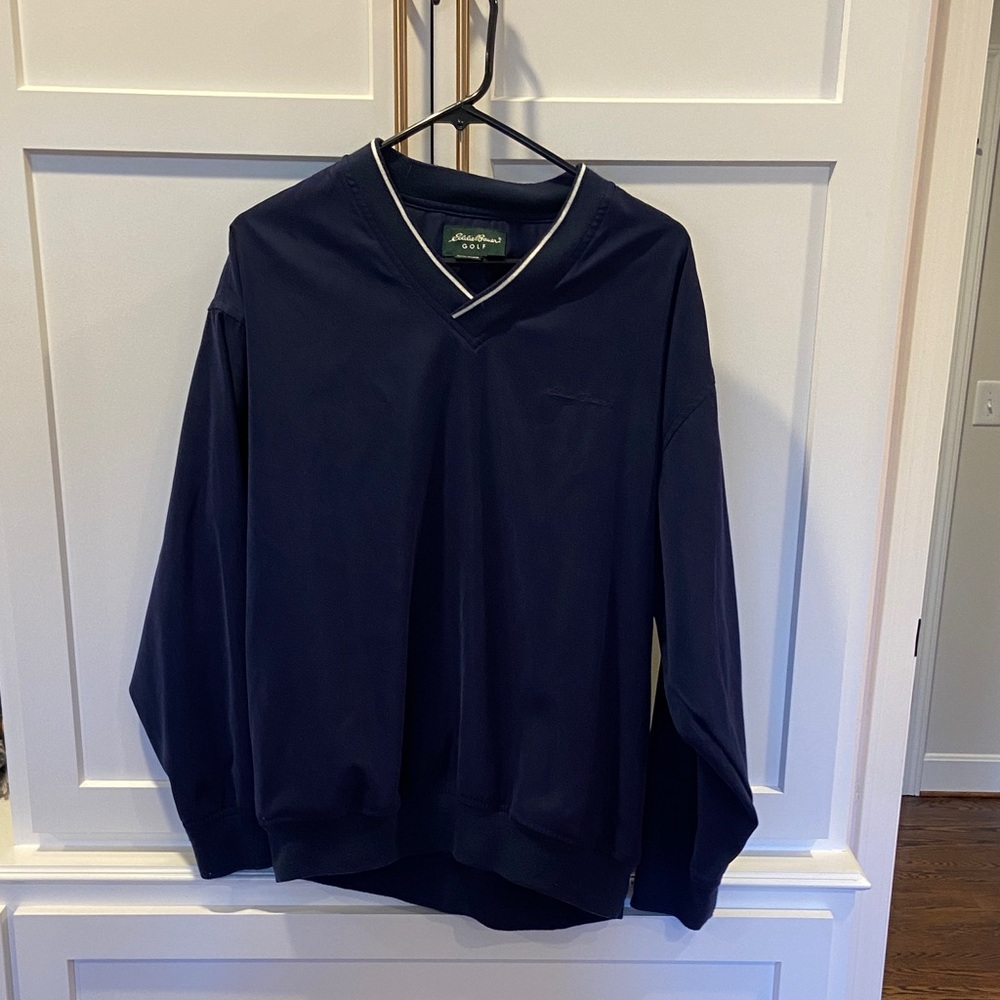 Eddie Bauer Golf Men's Deep Blue V-Neck windbreaker pullover.